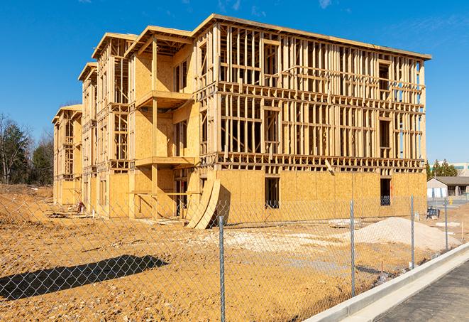 a view of a temporary chain link fence that surrounds a construction site, providing security in Hainesport NJ